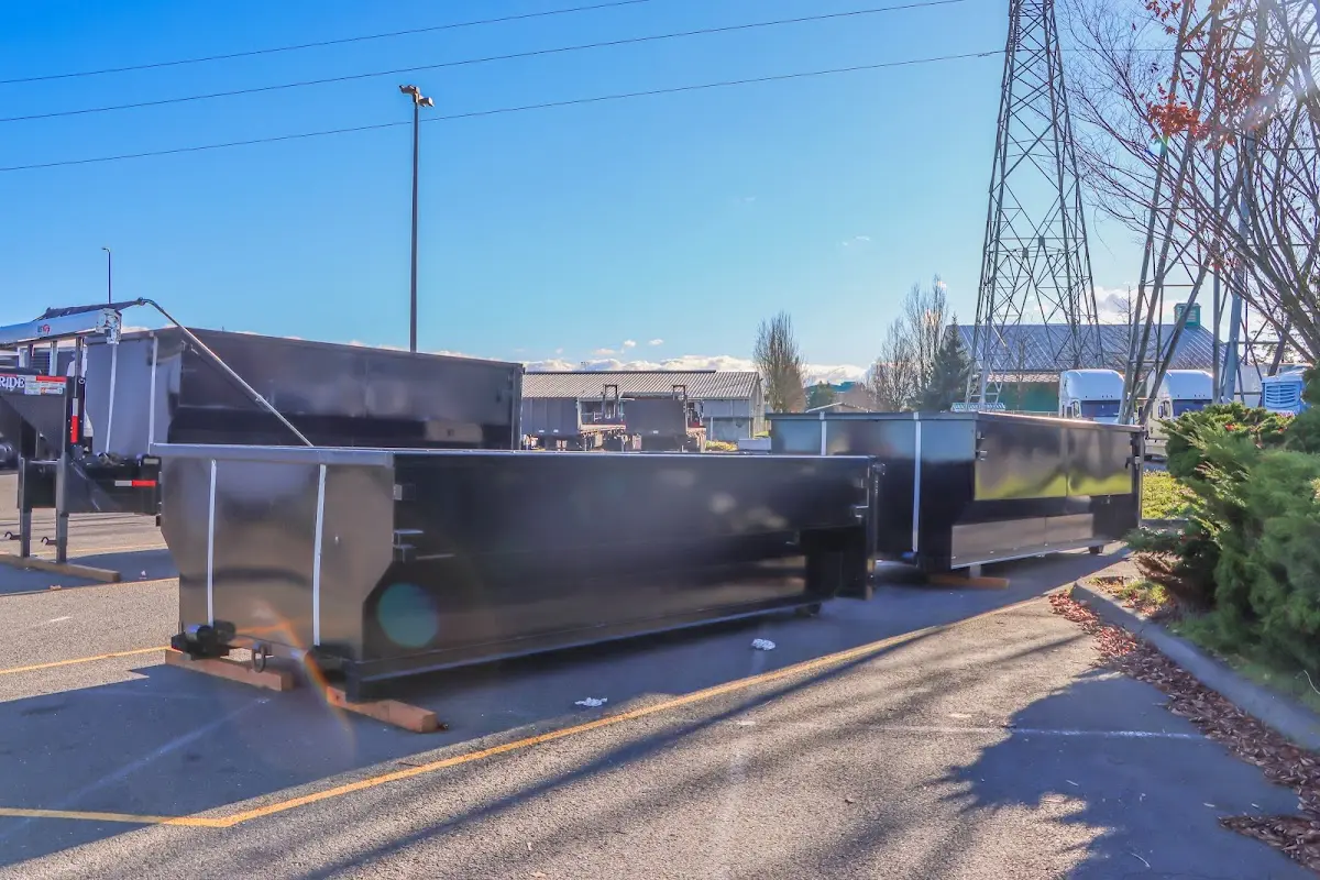 Roll-off dumpster ready for waste disposal at job site for Yard Waste Dumpster Rental in Redland